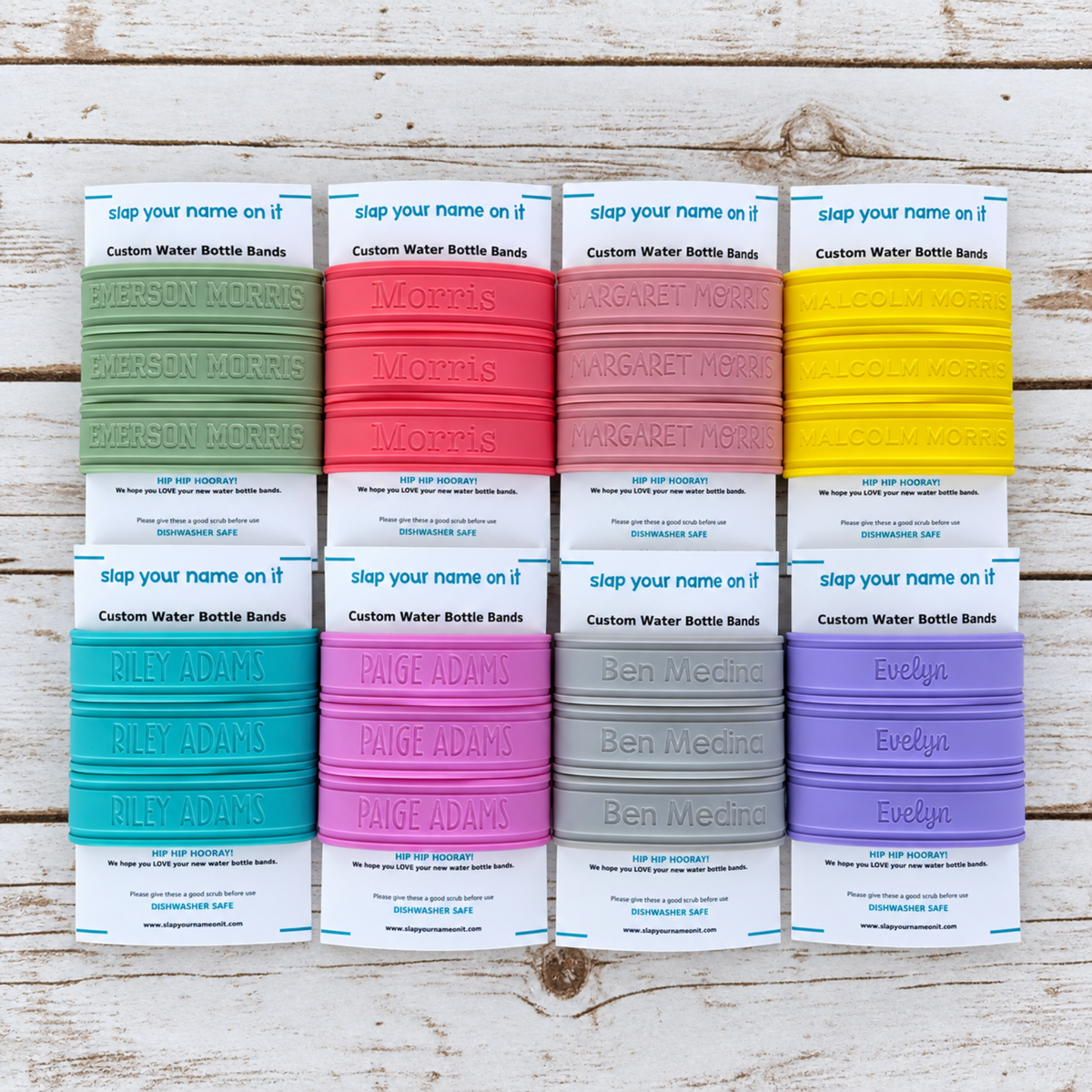 Personalized silicone water bottle bands in eight colors, shown in three-packs with engraved names on product cards.